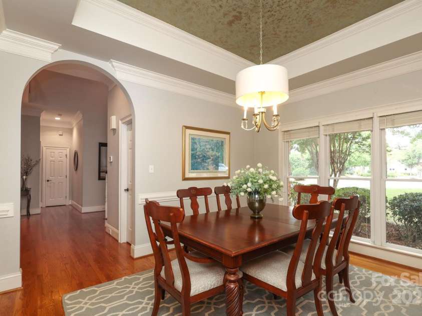 10840 Congressional Club Drive, Charlotte, NC 28277.  MLS# CAR4286308, YatesRealty ID 29804. Arched doorway to dining room