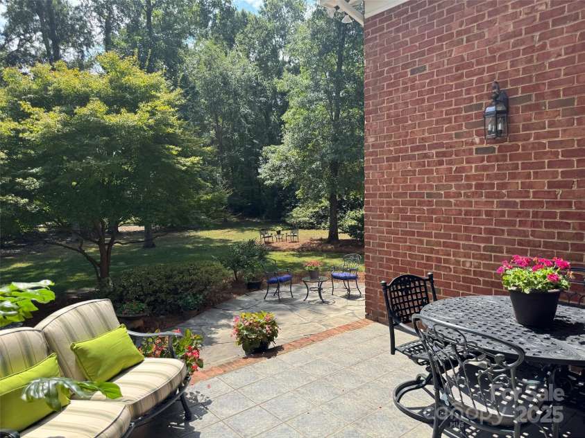 10840 Congressional Club Drive, Charlotte, NC 28277.  MLS# CAR4286308, YatesRealty ID 29804. Raised terrace to stone patio