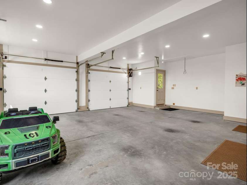 609 Green Creek Drive, Columbus, NC 28722.  MLS# CAR4288033, YatesRealty ID 29805. 2-Car garage