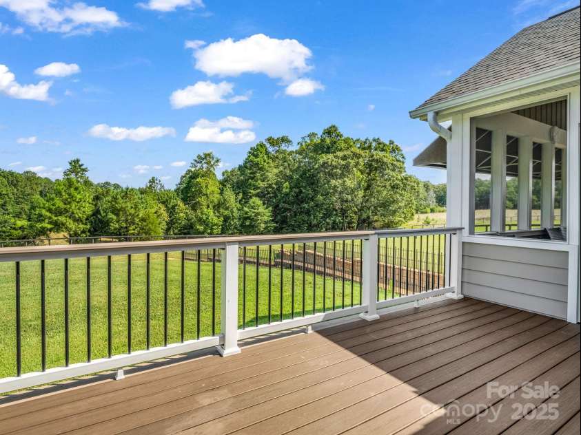 609 Green Creek Drive, Columbus, NC 28722.  MLS# CAR4288033, YatesRealty ID 29805. Back deck connected to screened in porch