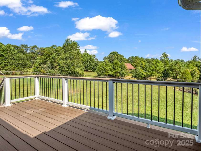 609 Green Creek Drive, Columbus, NC 28722.  MLS# CAR4288033, YatesRealty ID 29805. Back deck connected to screened in porch