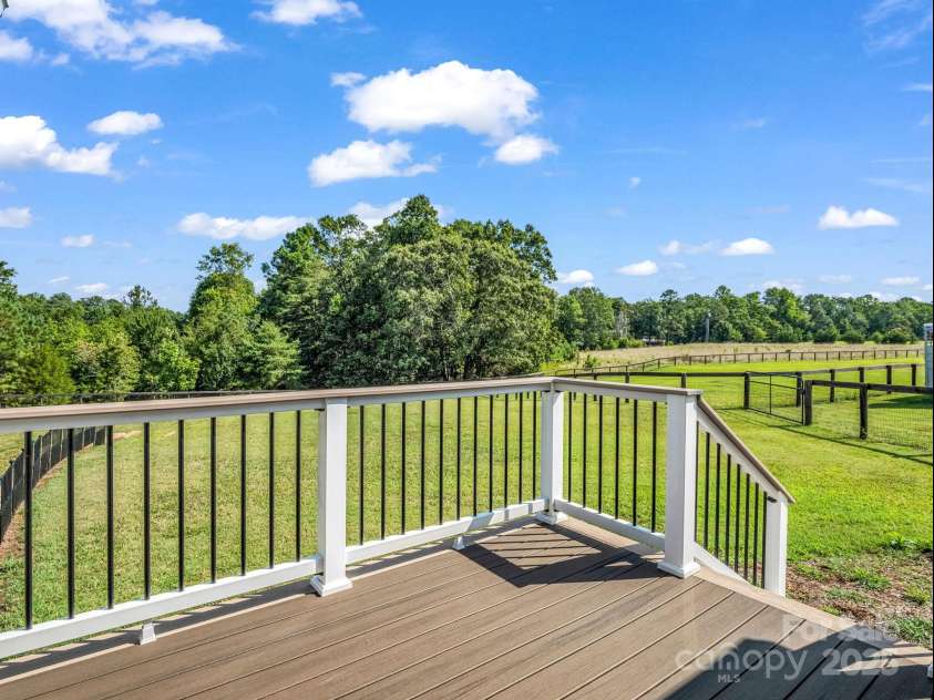 609 Green Creek Drive, Columbus, NC 28722.  MLS# CAR4288033, YatesRealty ID 29805. Back deck connected to screened in porch