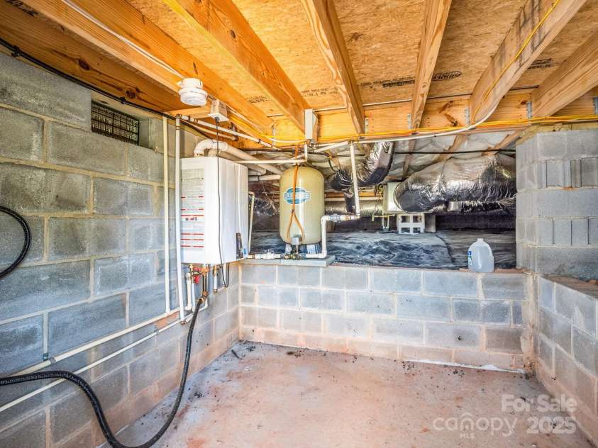 609 Green Creek Drive, Columbus, NC 28722.  MLS# CAR4288033, YatesRealty ID 29805. Walk in crawl space