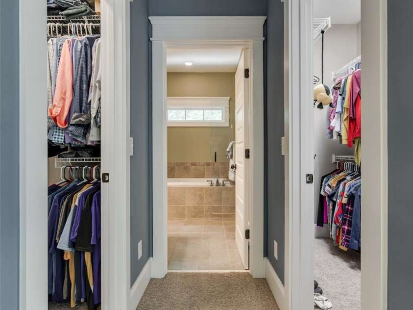 10008 Cuyo Court, Tega Cay, SC 29708.  MLS# CAR4195989, YatesRealty ID 2981. Hallway to owners retreat - his & her walk-in closets to either side