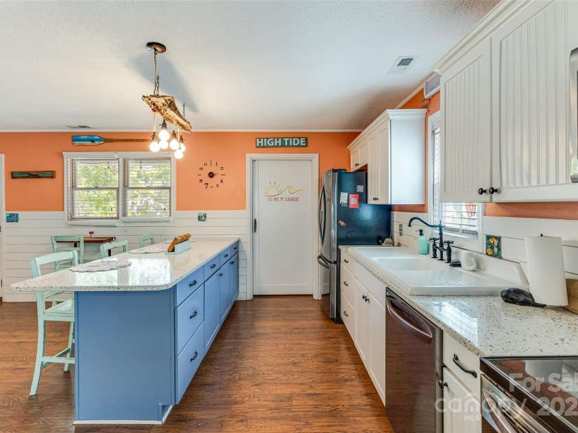 159 6th Street, Oak Island, NC 28465.  MLS# CAR4292582, YatesRealty ID 2981. 