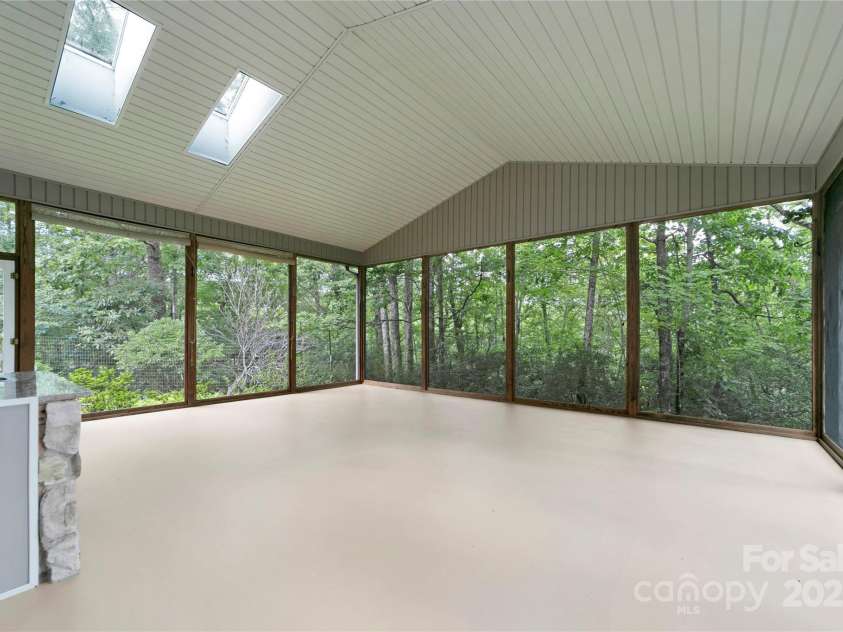 273 Inoli Circle, Brevard, NC 28712.  MLS# CAR4286189, YatesRealty ID 29820. Over sized sceen Porch for entertaining