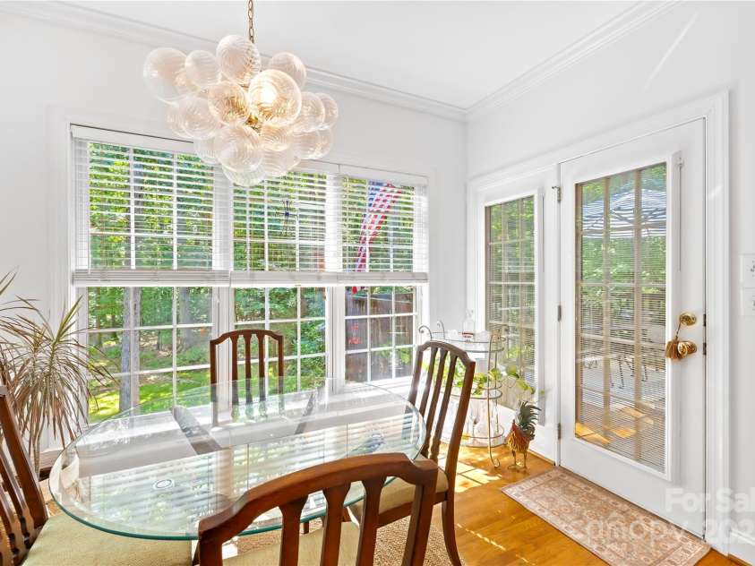 20601 Autumn Breeze Court, Cornelius, NC 28031.  MLS# CAR4284173, YatesRealty ID 29825. Eating area leads to back deck