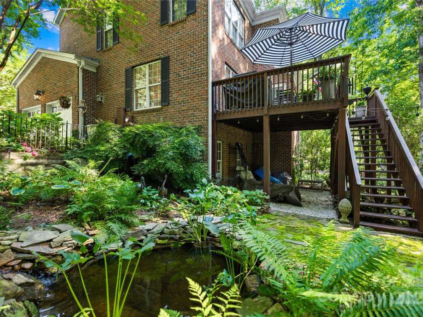 20601 Autumn Breeze Court, Cornelius, NC 28031.  MLS# CAR4284173, YatesRealty ID 29825. Enjoy pond waterfall from deck