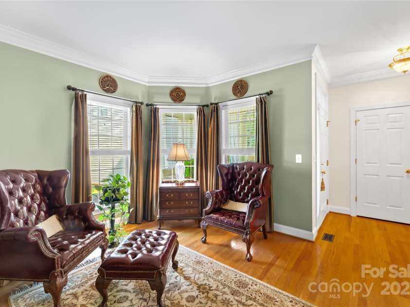 20601 Autumn Breeze Court, Cornelius, NC 28031.  MLS# CAR4284173, YatesRealty ID 29825. Front sitting room