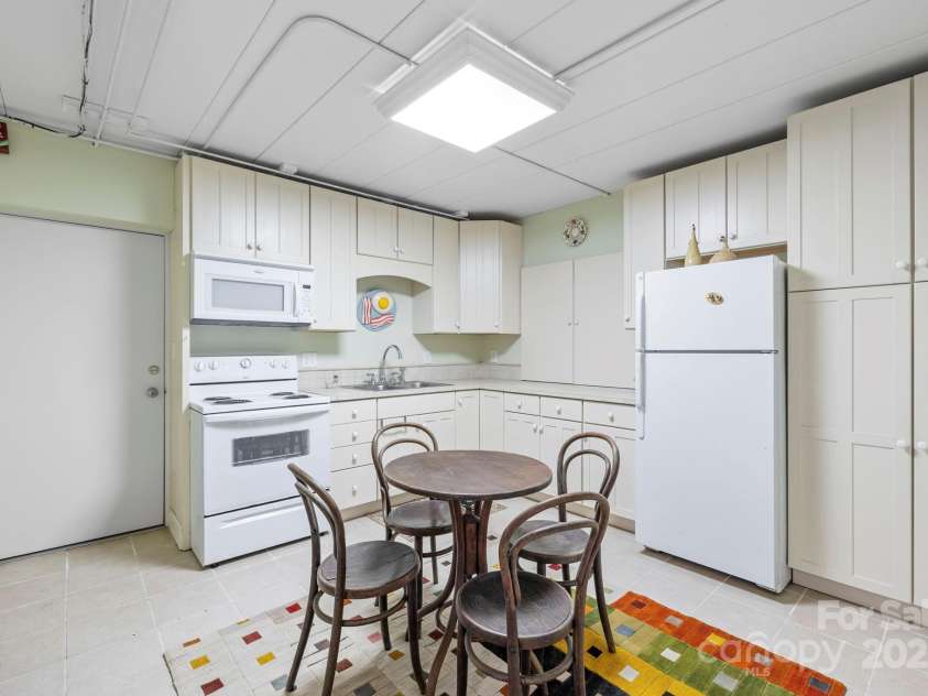 21 Rhododendron Road, Black Mountain, NC 28711.  MLS# CAR4266753, YatesRealty ID 29832. 2nd Kitchen~ basement