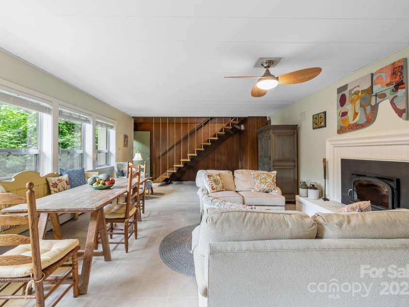 21 Rhododendron Road, Black Mountain, NC 28711.  MLS# CAR4266753, YatesRealty ID 29832. 2nd living room w/fireplace basement