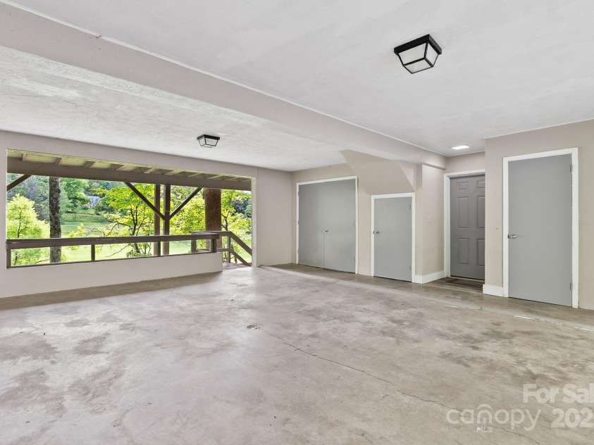 386 Country Club Drive, Canton, NC 28716.  MLS# CAR4272951, YatesRealty ID 29833. Carport