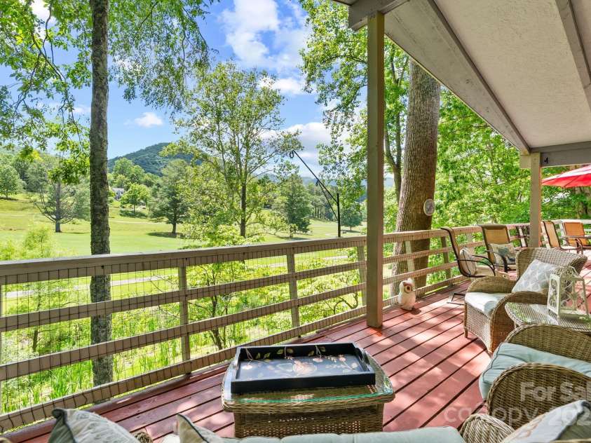 386 Country Club Drive, Canton, NC 28716.  MLS# CAR4272951, YatesRealty ID 29833. Deck - covered portion