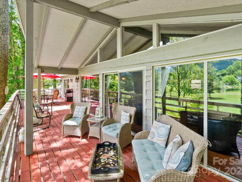 386 Country Club Drive, Canton, NC 28716.  MLS# CAR4272951, YatesRealty ID 29833. Deck - covered portion