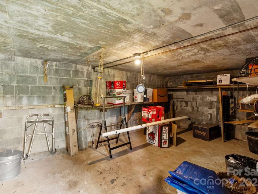 386 Country Club Drive, Canton, NC 28716.  MLS# CAR4272951, YatesRealty ID 29833. Golf Cart Garage