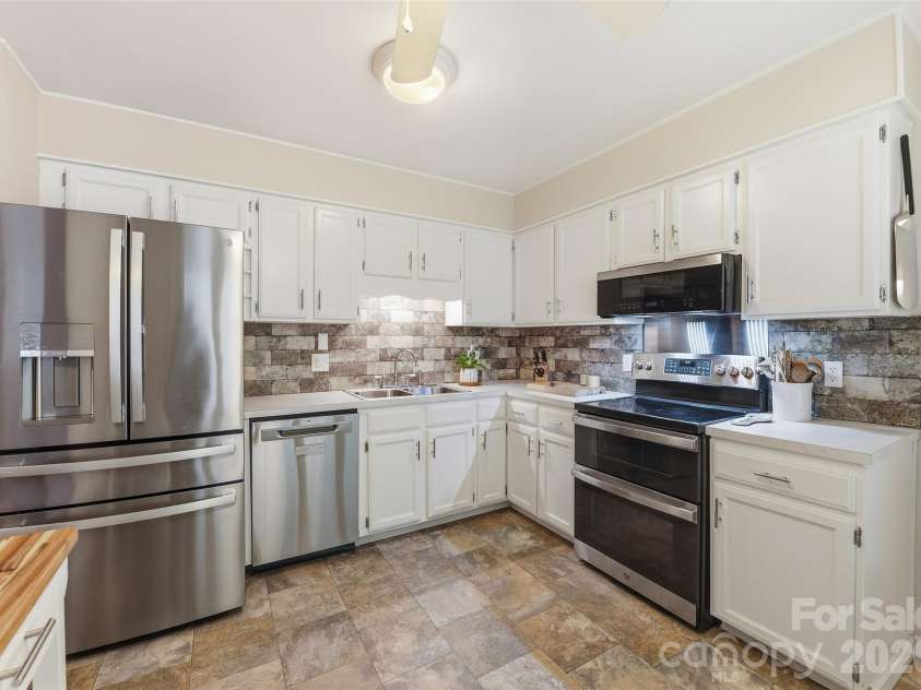1296 Country Club Drive, Cullowhee, NC 28723.  MLS# CAR4393175, YatesRealty ID 29839. 