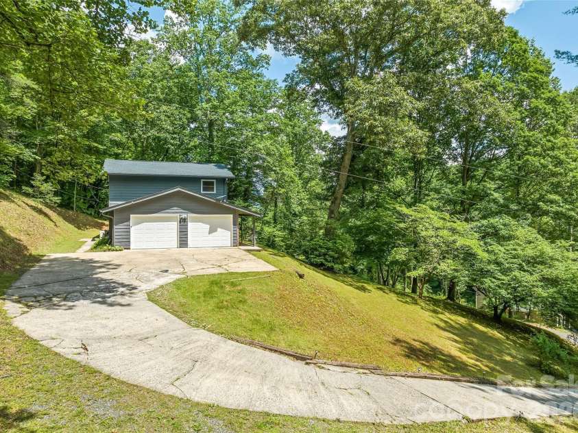 1296 Country Club Drive, Cullowhee, NC 28723.  MLS# CAR4393175, YatesRealty ID 29839. 