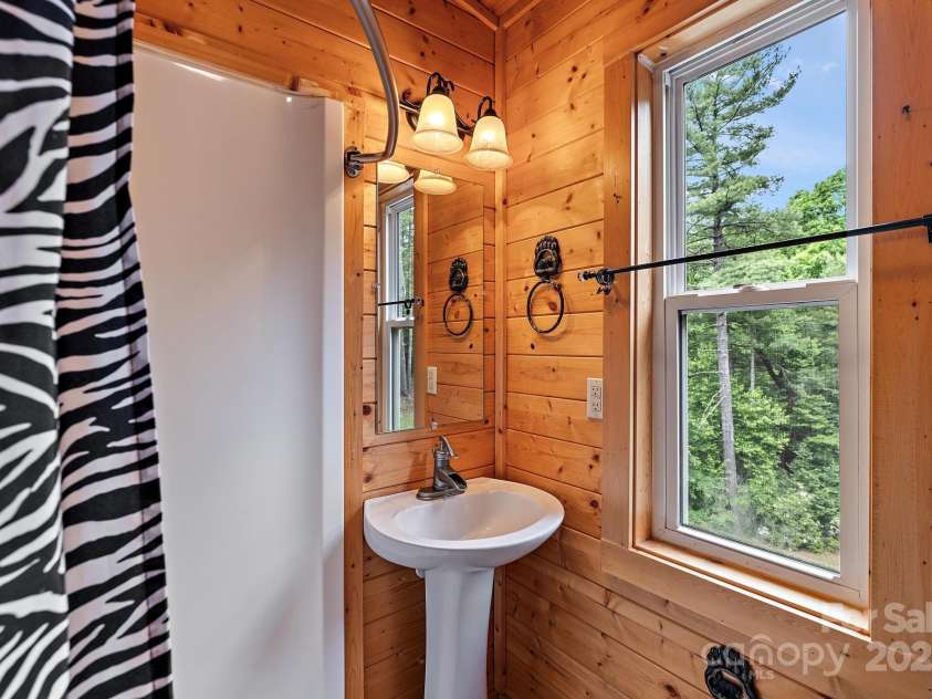 1158 Staghorn Road, Purlear, NC 28665.  MLS# CAR4210879, YatesRealty ID 2985. Loft Bedroom Ensuite Bathroom