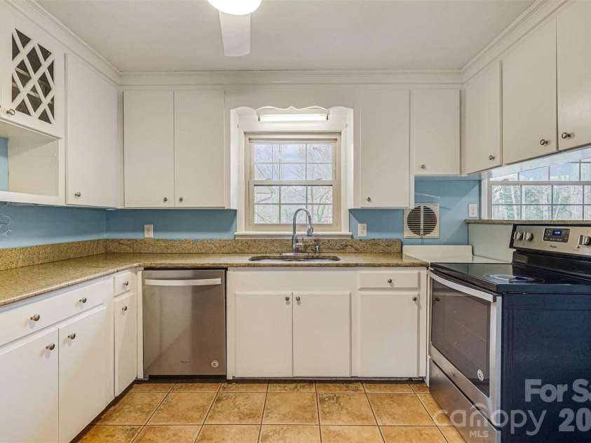 811 Parkwood Road, Shelby, NC 28150.  MLS# CAR4351663, YatesRealty ID 2985. The functional kitchen has a great layout,...