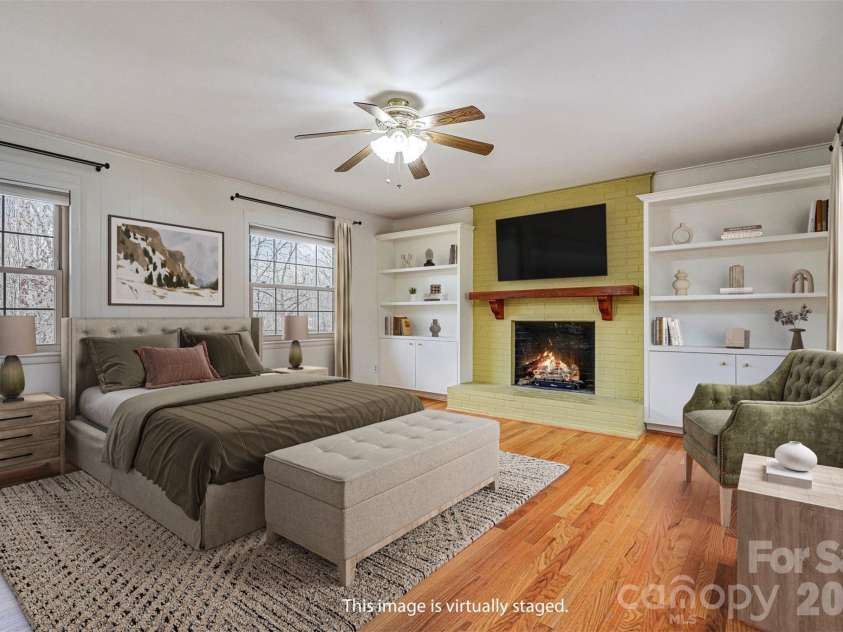 811 Parkwood Road, Shelby, NC 28150.  MLS# CAR4351663, YatesRealty ID 2985. *Virtually staged photo* The primary bedroom has a brick hearth fireplace...