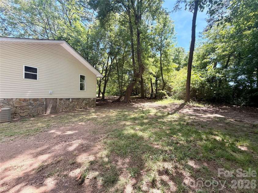 3910 Oakwood Circle, Iron Station, NC 28080.  MLS# CAR4378184, YatesRealty ID 29859. Backyard