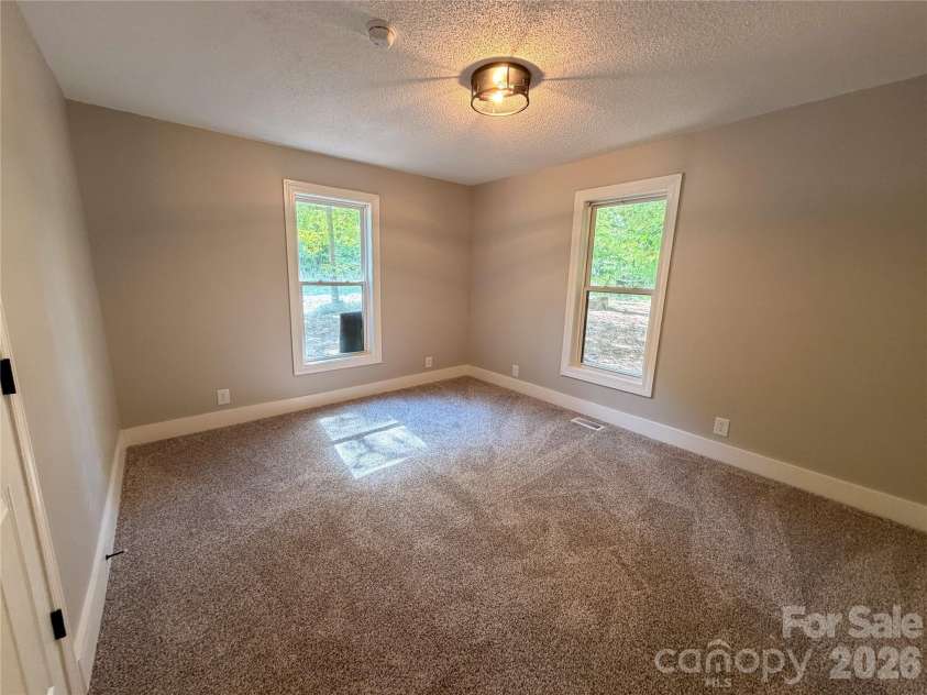 3910 Oakwood Circle, Iron Station, NC 28080.  MLS# CAR4378184, YatesRealty ID 29859. Bed 1