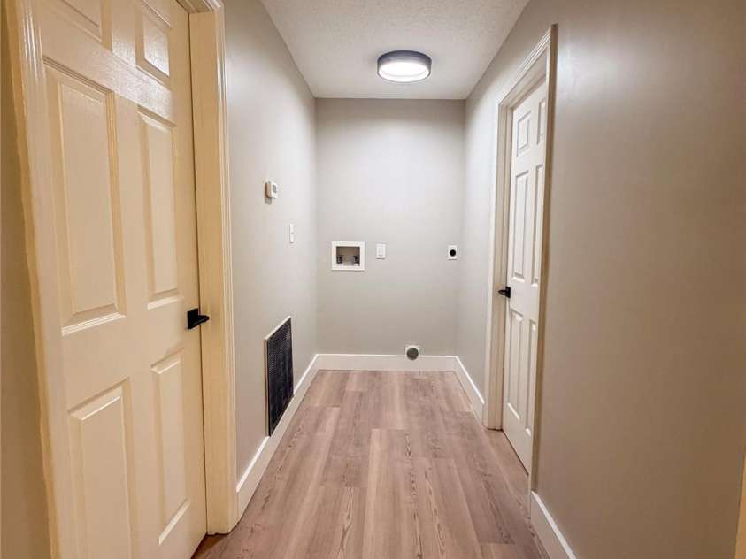 3910 Oakwood Circle, Iron Station, NC 28080.  MLS# CAR4378184, YatesRealty ID 29859. Hallway/laundry