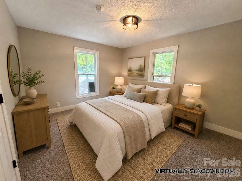 3910 Oakwood Circle, Iron Station, NC 28080.  MLS# CAR4378184, YatesRealty ID 29859. Virtually staged bedroom