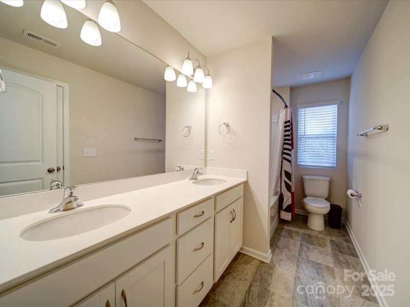 5028 Colline Court, Charlotte, NC 28216.  MLS# CAR4221799, YatesRealty ID 2986. Bathroom 2