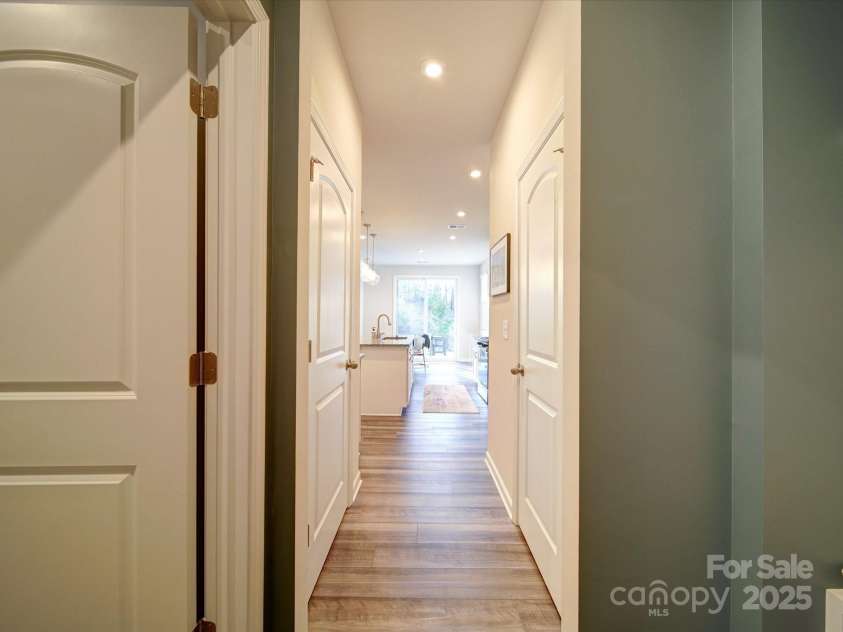 5028 Colline Court, Charlotte, NC 28216.  MLS# CAR4221799, YatesRealty ID 2986. Hall to Laundry, Drop Zone, & Garage