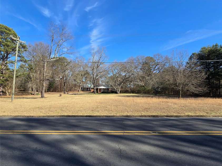 5323 New Hope Road, Belmont, NC 28012.  MLS# CAR4338697, YatesRealty ID 2986. Property from across S New Hope Rd