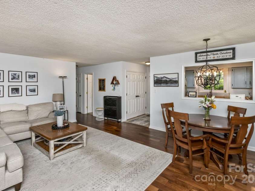 107 Cedar Forest Trail, Asheville, NC 28803.  MLS# CAR4276126, YatesRealty ID 29863. Large living room and dining area