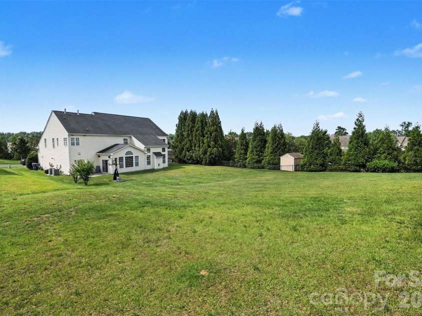 4396 Foxfield Court, Harrisburg, NC 28075.  MLS# CAR4392294, YatesRealty ID 29869. Backyard