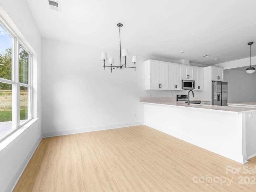 5125 Carden Drive, Charlotte, NC 28227.  MLS# CAR4250454, YatesRealty ID 29879. Dining room