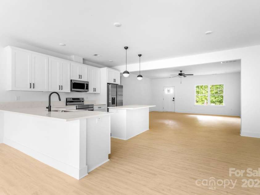 5125 Carden Drive, Charlotte, NC 28227.  MLS# CAR4250454, YatesRealty ID 29879. Kitchen / Living room