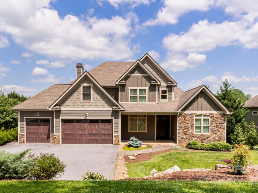 19 Carrolls Place Court, Mills River, NC 28759.  MLS# CAR4282064, YatesRealty ID 29890. Front of property, showcasing the 3 car garage