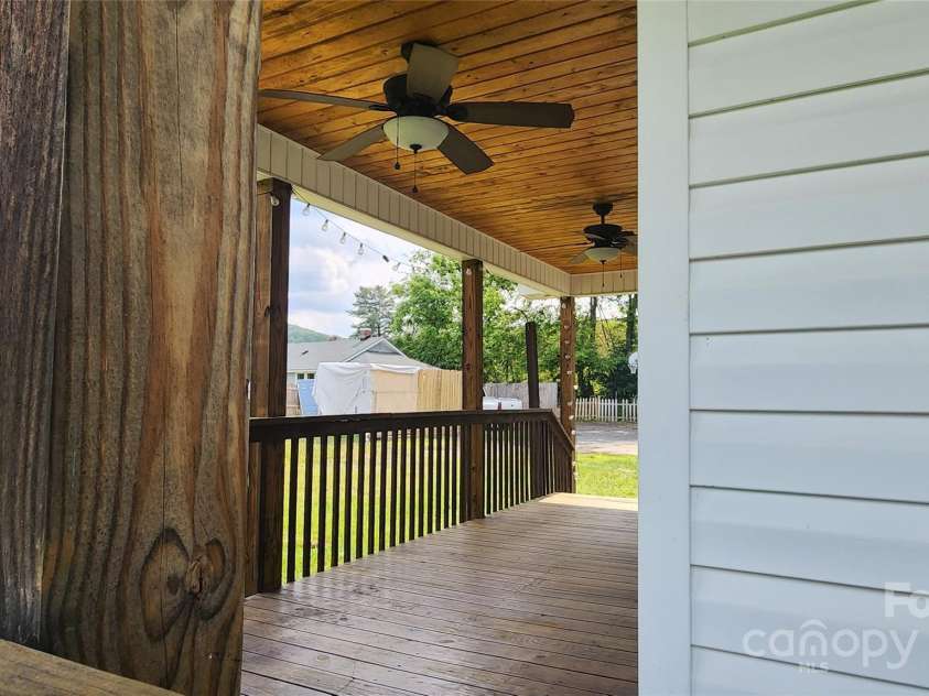 85 Oshea Lane, Waynesville, NC 28786.  MLS# CAR4265816, YatesRealty ID 29891. Back Porch with Ceiling Fans