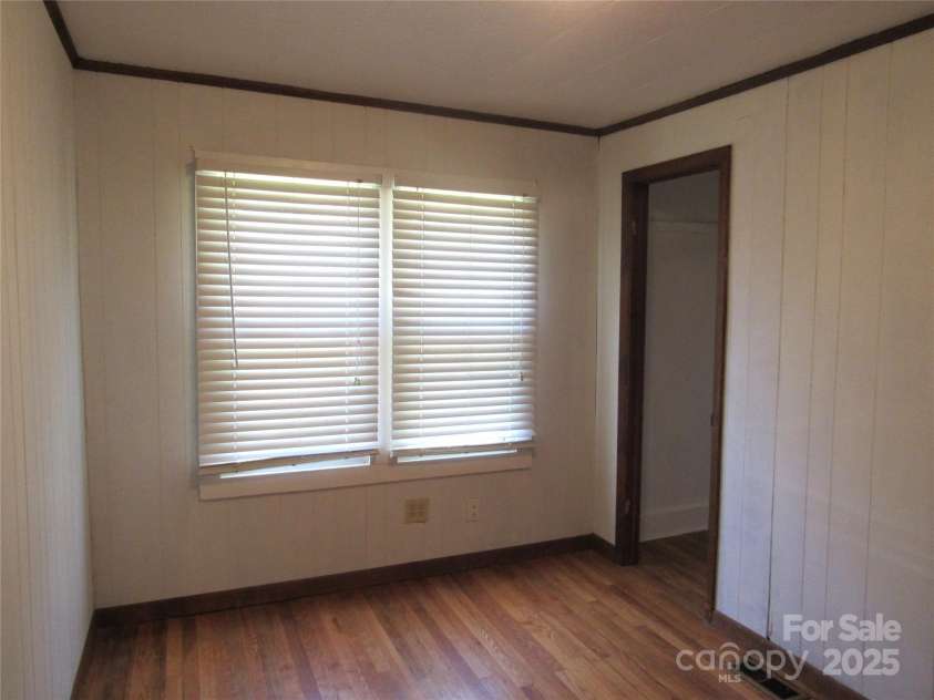 85 Oshea Lane, Waynesville, NC 28786.  MLS# CAR4265816, YatesRealty ID 29891. Bedroom 2 with walk in closet