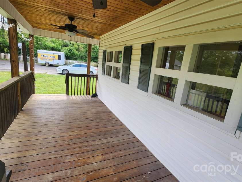 85 Oshea Lane, Waynesville, NC 28786.  MLS# CAR4265816, YatesRealty ID 29891. Spacious Back Porch