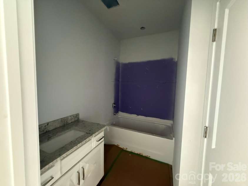 4021 Juno Drive, Charlotte, NC 28215.  MLS# CAR4392670, YatesRealty ID 29893. Guest bath on main floor
