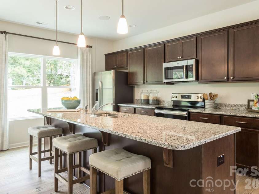 4021 Juno Drive, Charlotte, NC 28215.  MLS# CAR4392670, YatesRealty ID 29893. The following are representative photos only - actual selections may vary.