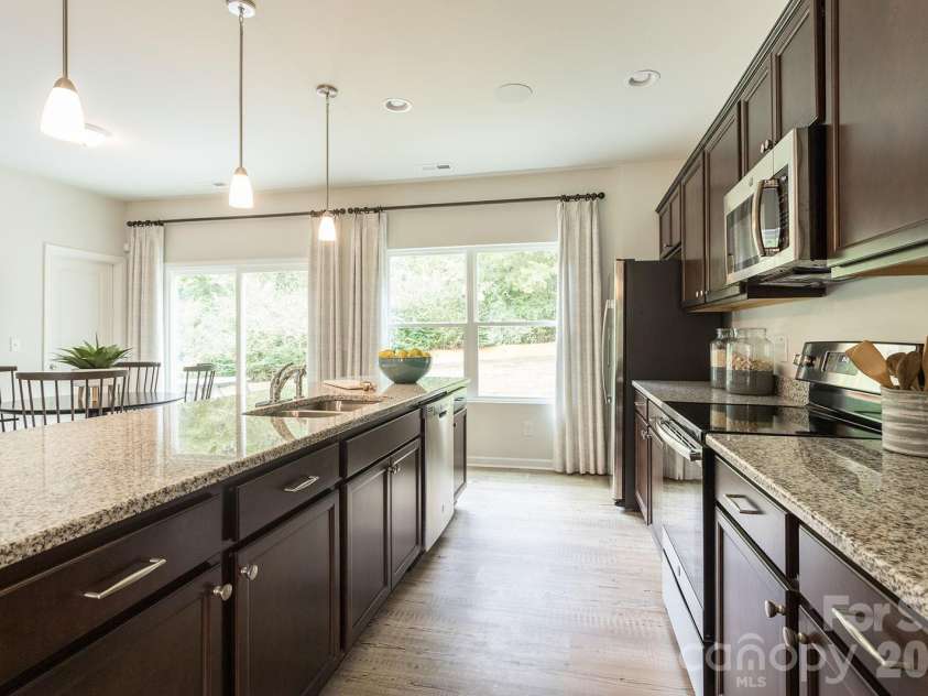 4021 Juno Drive, Charlotte, NC 28215.  MLS# CAR4392670, YatesRealty ID 29893. The following are representative photos only - actual selections may vary.