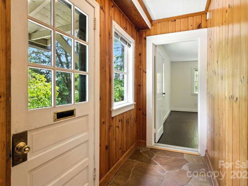 92 Hamburg Mountain Road, Weaverville, NC 28787.  MLS# CAR4285985, YatesRealty ID 29895. Guest cabin