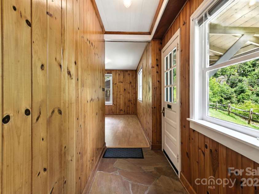 92 Hamburg Mountain Road, Weaverville, NC 28787.  MLS# CAR4285985, YatesRealty ID 29895. Guest cabin