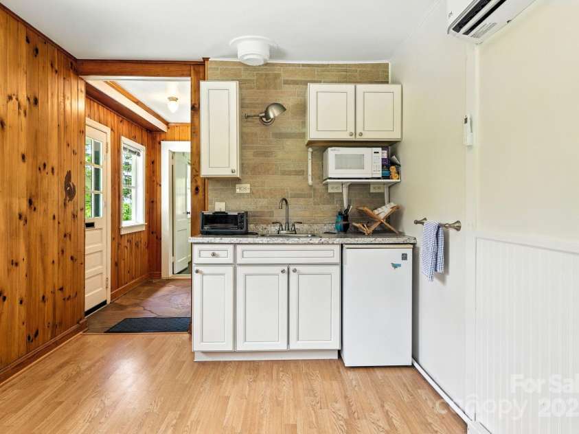 92 Hamburg Mountain Road, Weaverville, NC 28787.  MLS# CAR4285985, YatesRealty ID 29895. Guest cabin