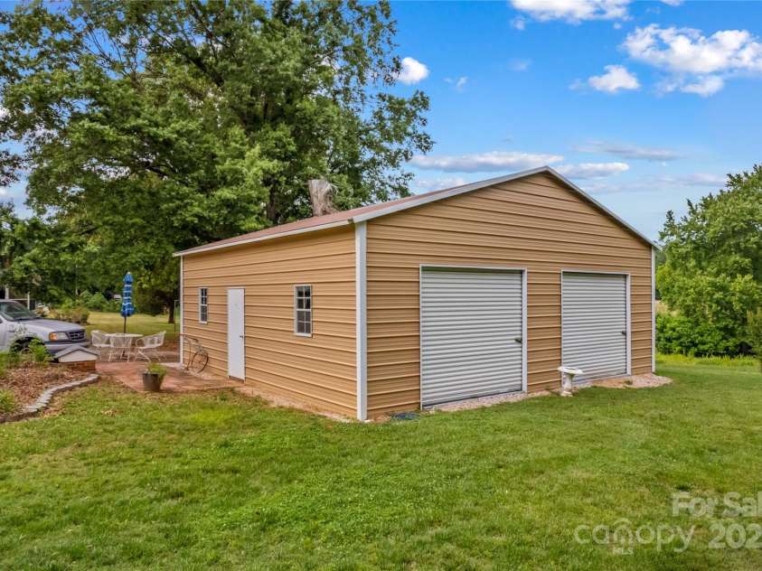 648 Odell School Road, Concord, NC 28027.  MLS# CAR4260231, YatesRealty ID 29897. 30x30 workshop