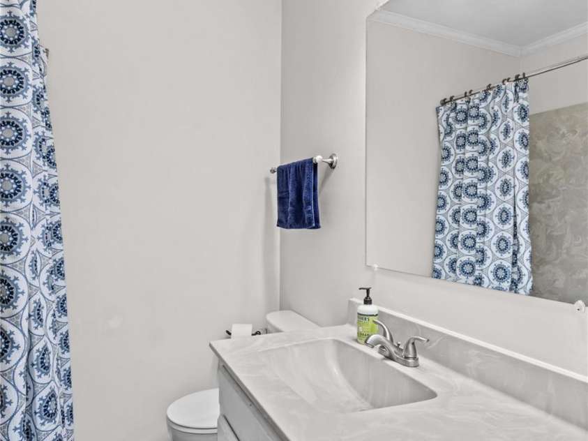 648 Odell School Road, Concord, NC 28027.  MLS# CAR4260231, YatesRealty ID 29897. Hall bathroom