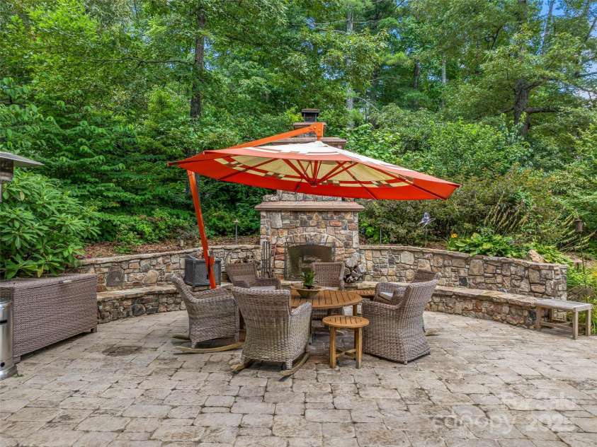 212 Plains Drive, Asheville, NC 28803.  MLS# CAR4284711, YatesRealty ID 29898. Artisan stone work throughout this homesite