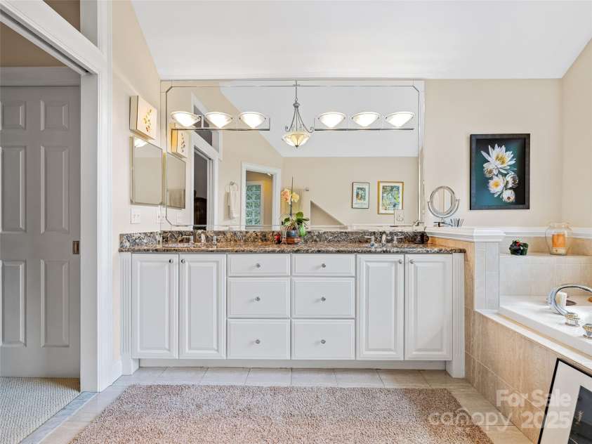 212 Plains Drive, Asheville, NC 28803.  MLS# CAR4284711, YatesRealty ID 29898. Light and bright primary bath