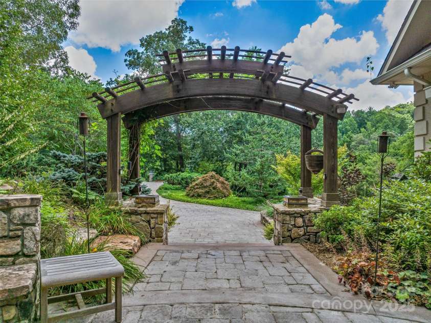 212 Plains Drive, Asheville, NC 28803.  MLS# CAR4284711, YatesRealty ID 29898. Mature, well designed landscaping